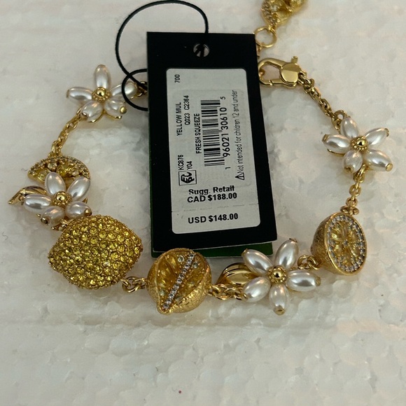 Kate Spade Gold Charm Bracelet with Whimsical Details - Picture 6 of 7